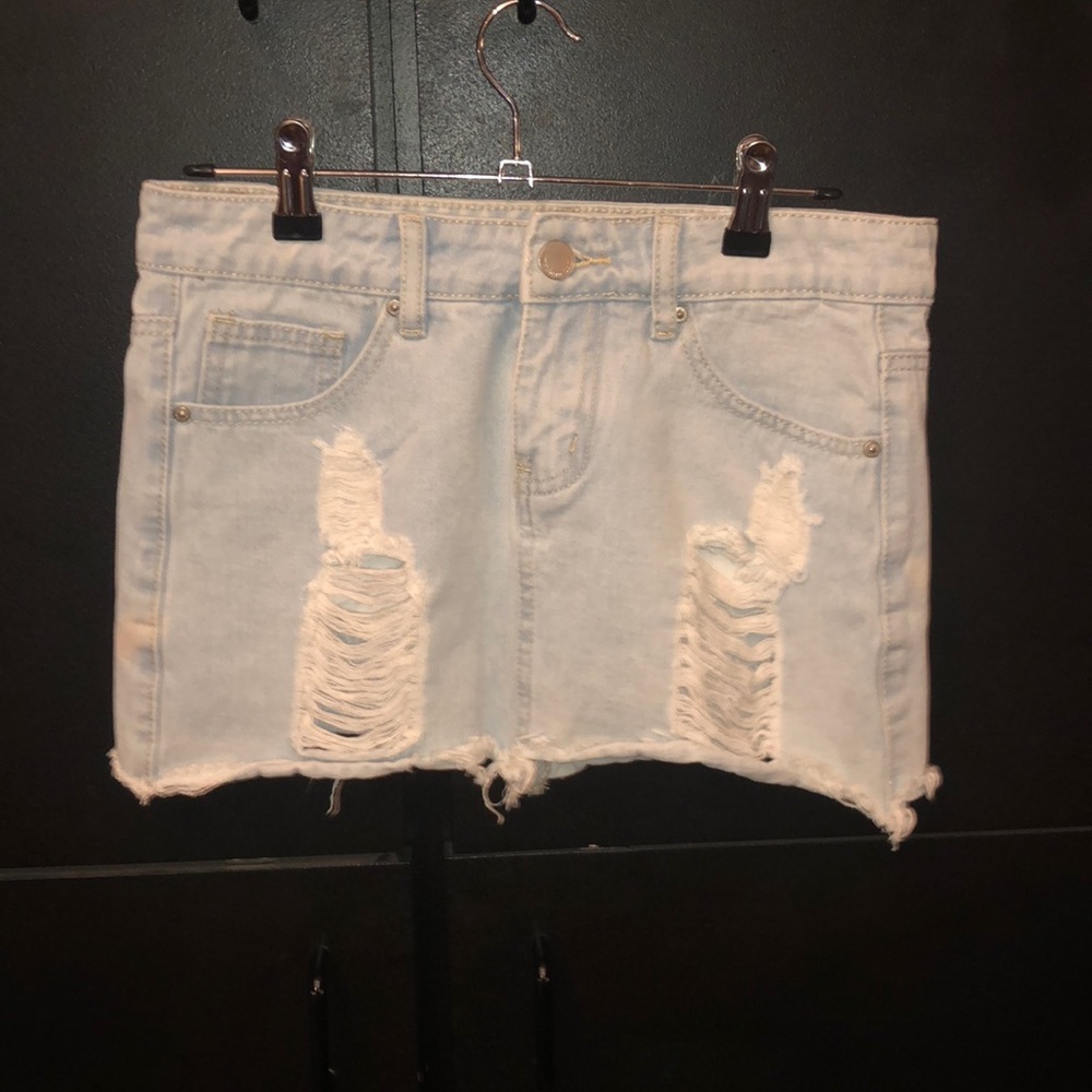 Acid light wash ripped denim mini skirt